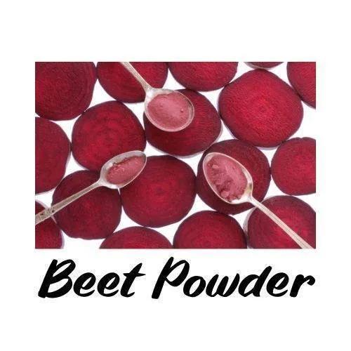 Beets with spoons containing beet powder on a white background