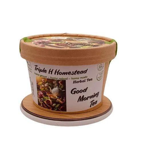 Container of Triple H Homestead 'Good Morning Tea' with a decorative lid on a white background