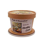 Container of Triple H Homestead Herbal Tea with 'Healthy Liver' label on a white background