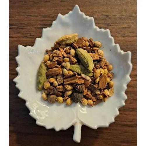 Herbal Chai on a white leaf-shaped dish.