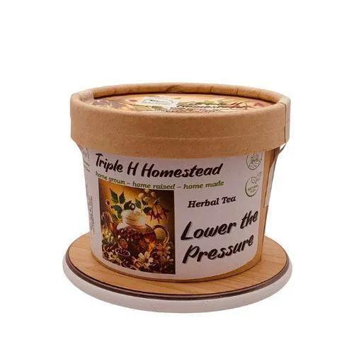 Tea container with 'Triple H Homestead' branding on a white background