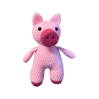 Pink crochet pig toy on a transparent background