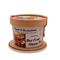 Container of Triple H Homestead Red Fruit Happy Tea on a white background