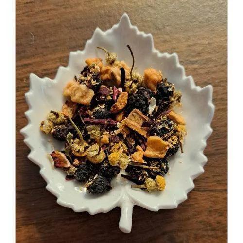 Saskatchewan Christmas Tea on a white leaf-shaped plate on a wooden surface