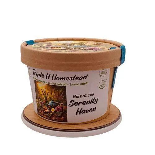 Herbal tea container with 'Triple H Homestead' branding on a white background