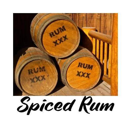 Three wooden rum barrels with 'Rum XXX' text on a wooden deck, labeled 'Spiced Rum'.