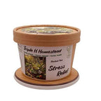 Container of Triple H Homestead herbal tea for stress relief on a white background
