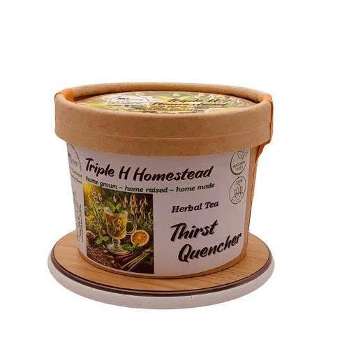 Container of Triple H Homestead Herbal Tea with a lid and base on a white background