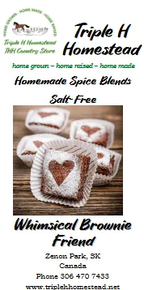 Advertisement for Triple H Homestead's Whimsical Brownie Friend spice blend with heart-shaped cookies on a wooden surface.