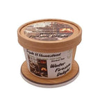 Container of Triple H Homestead Winter Fireside Delight herbal tea on a white background